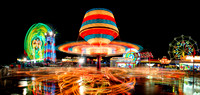 Carnival Rides In Motion.  Photostitched Panoramic.